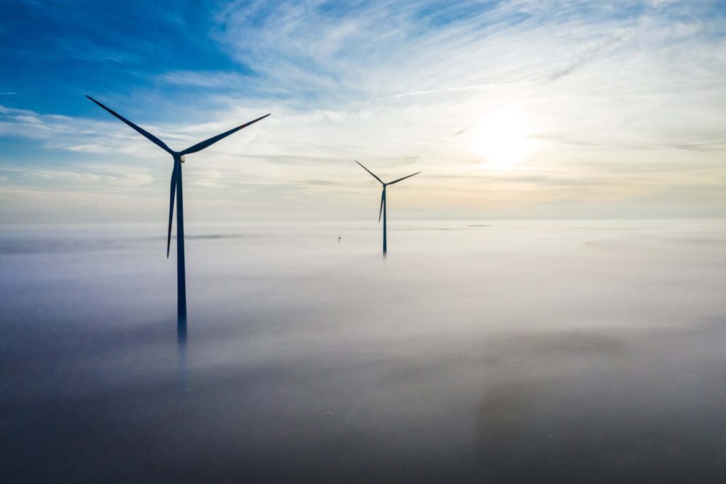 wind-turbines-over-fog-wind-farm-in-poland-renew-BNHJRQW.jpg